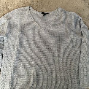 light blue sweater